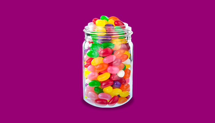 Jar full of different coloured jelly beans