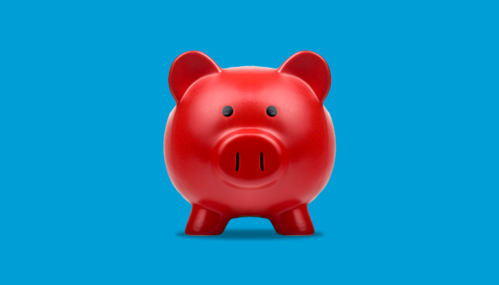 Red piggybank for saving coins