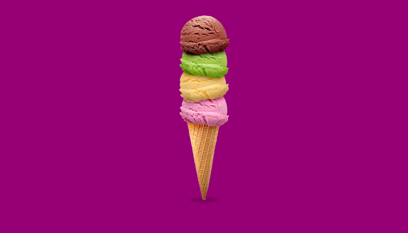 Ice cream cone with four different scoops
